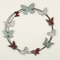 Decorative wreath with butterflies on a beige background